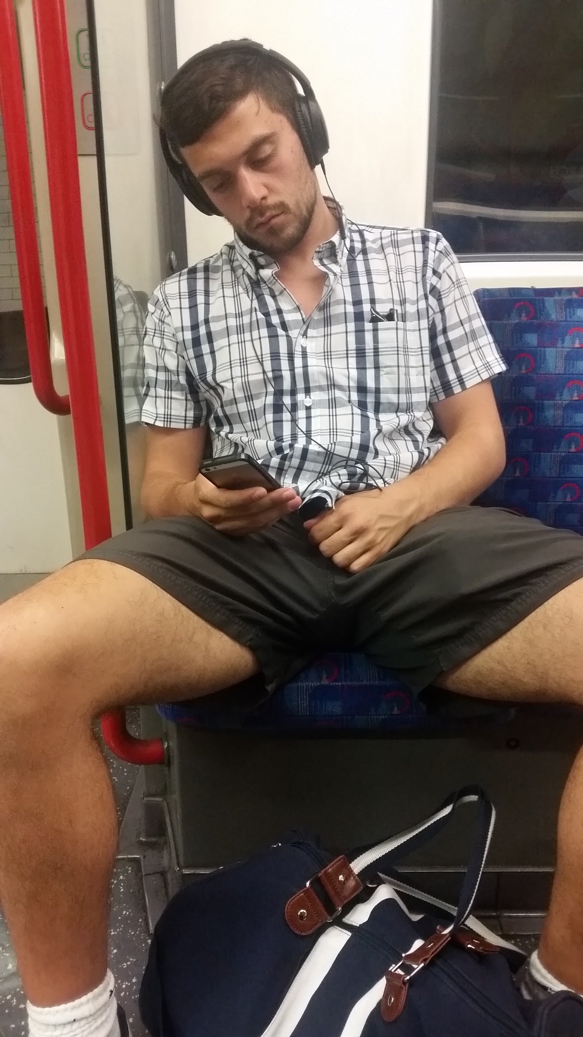 Résultat de recherche d'images pour "man hardon sitting in the subway"